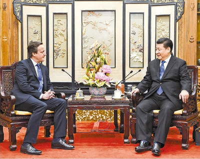 1月11日,国家主席习近平在北京钓鱼台国宾馆会见英国前首相卡梅伦。 新华社记者 李学仁摄