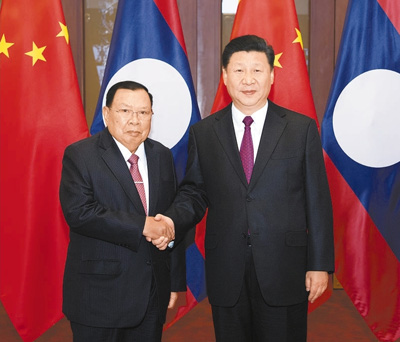 5月30日,中共中央总书记、国家主席习近平在北京同来华访问的老挝人民革命党中央总书记、国家主席本扬举行会谈。 新华社记者 李学仁摄