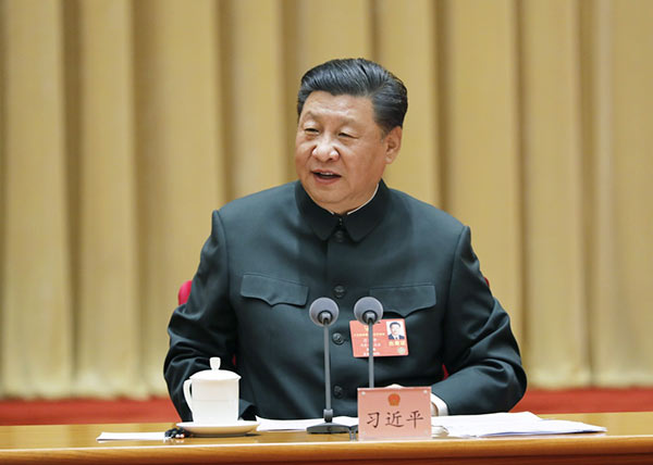 5月26日下午，中共中央总书记、国家主席、中央军委主席习近平出席十三届全国人大三次会议解放军和武警部队代表团全体会议并发表重要讲话。新华社记者 李刚 摄